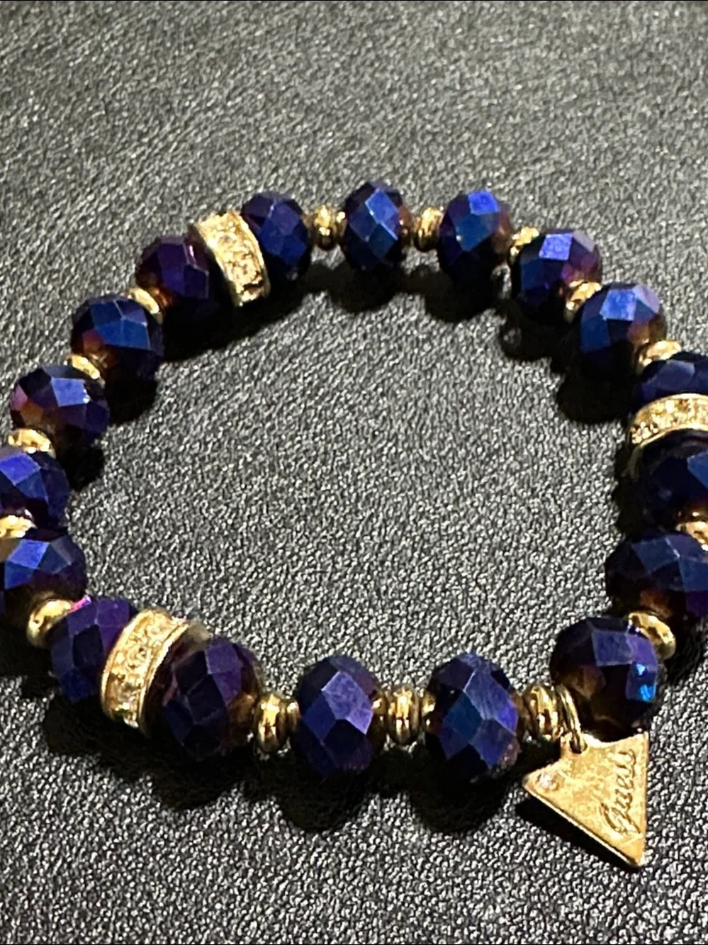 Guess Royal Blue Faceted Crystal Gold Tone Accent Stretch Bracelet